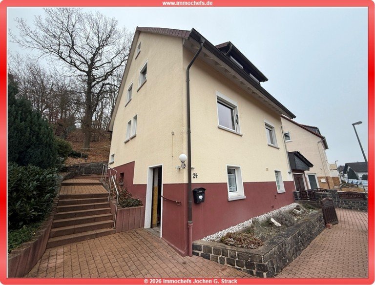 Hauptbild: Charmantes 1-2-Familienhaus in Neu-Anspach mit Garten und Garage zu verkaufen